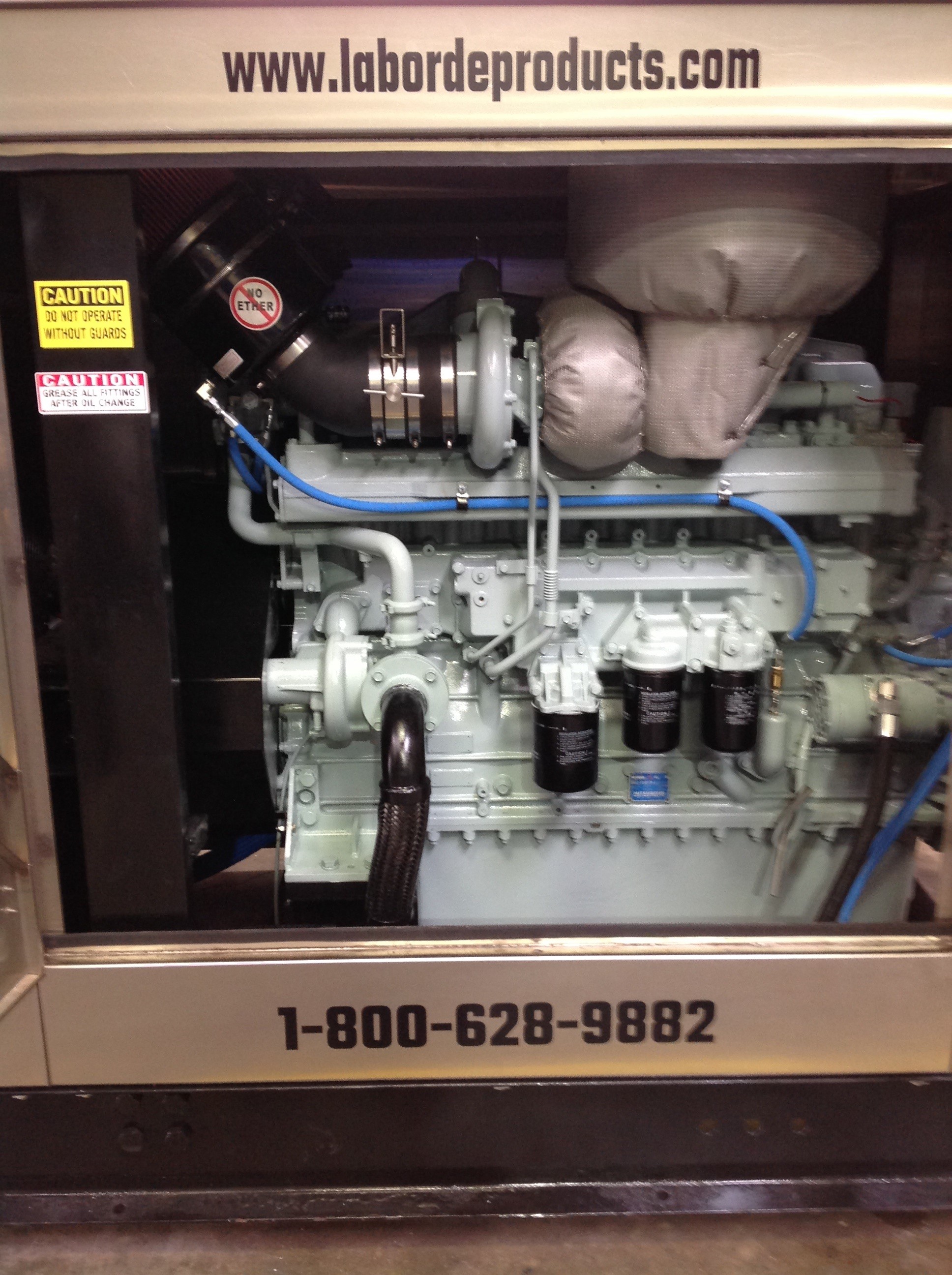After: Inside the enclosed barge engine unit after it's refresh 